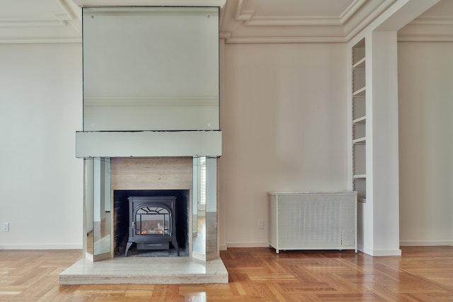 an-empty-property-with-wood-floors-and-a-white-fire-place