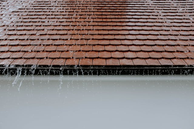 water-falling-off-a-roof